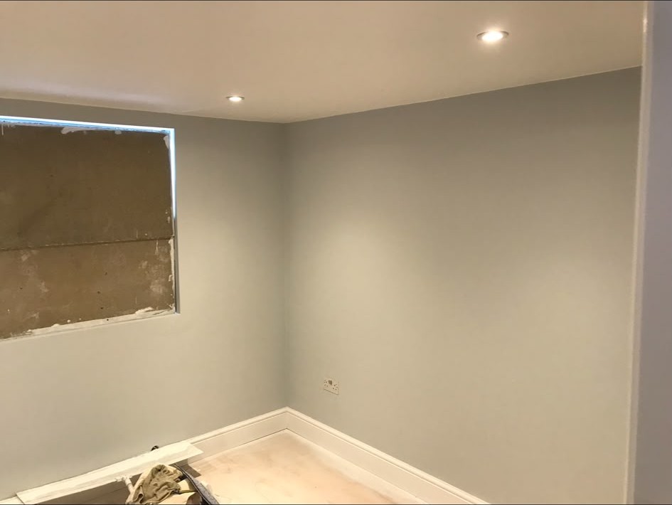 Recessed LED downlights installed and wired into a finished ceiling