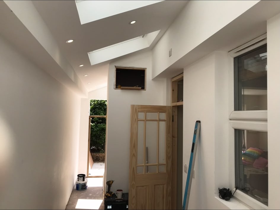 Recessed LED downlights installed and wired into a finished ceiling
