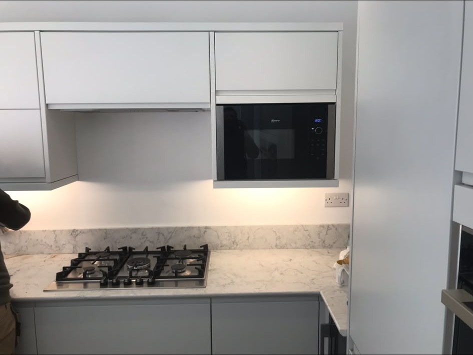 Kitchen lighting with recessed downlights and under-cabinet LED installed