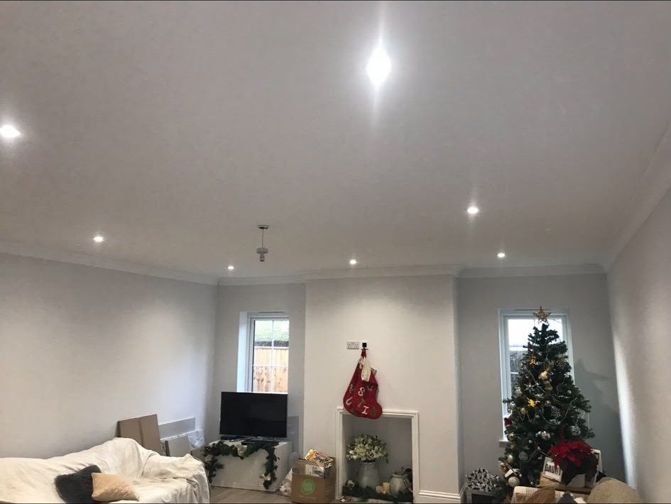 Recessed LED downlights installed and wired into a finished ceiling