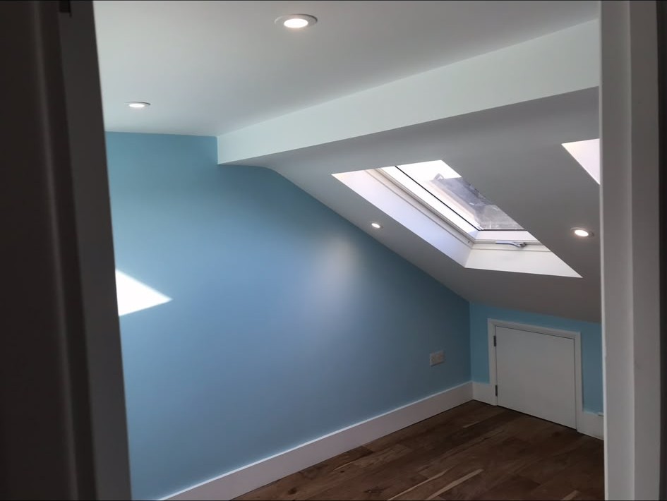 Recessed LED downlights installed and wired into a finished ceiling