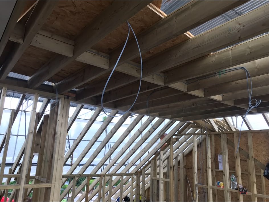 First fix rewire cabling dropped through new roof joists on an extension