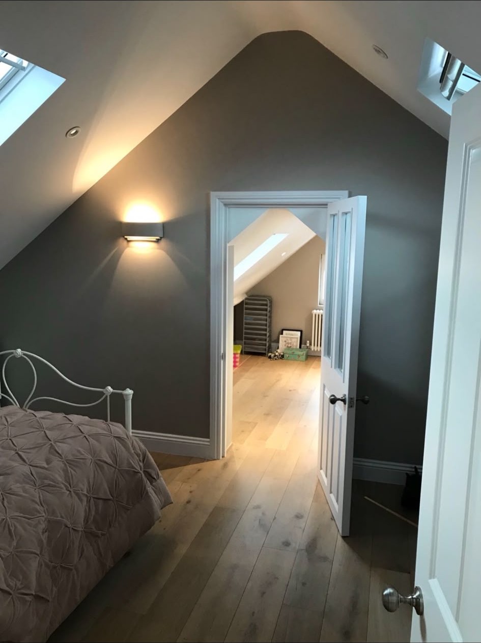 Wall light installation completed and switched in a finished room