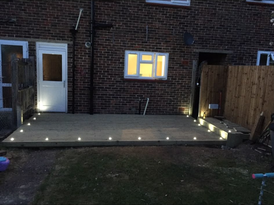 Recessed decking lights and rear garden lighting installed on a home in Surrey