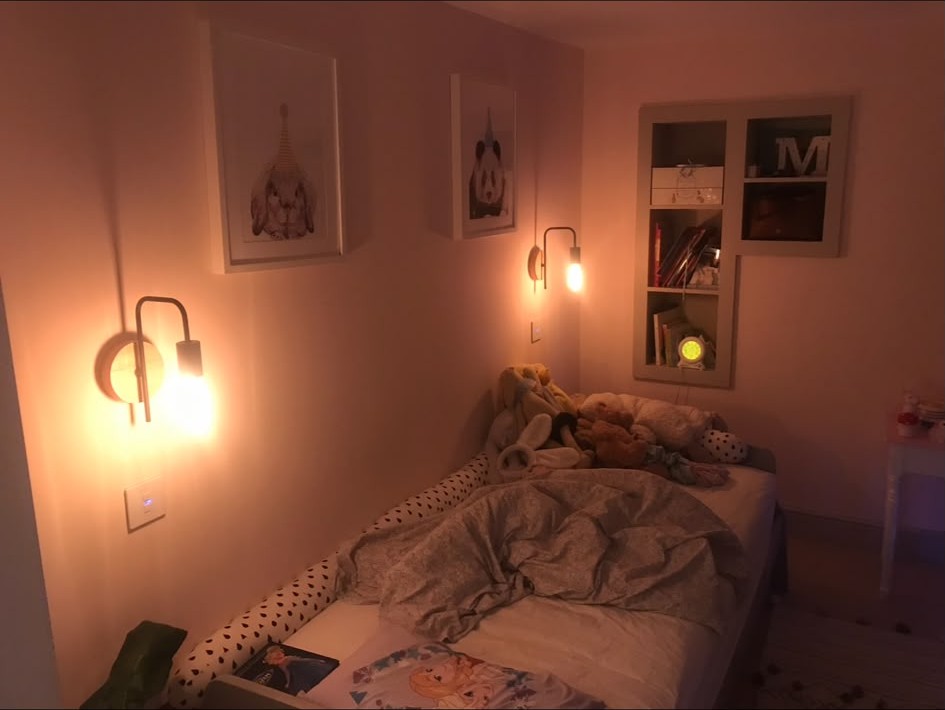 Decorative wall lights fitted in a bedroom and wired to new switch drops
