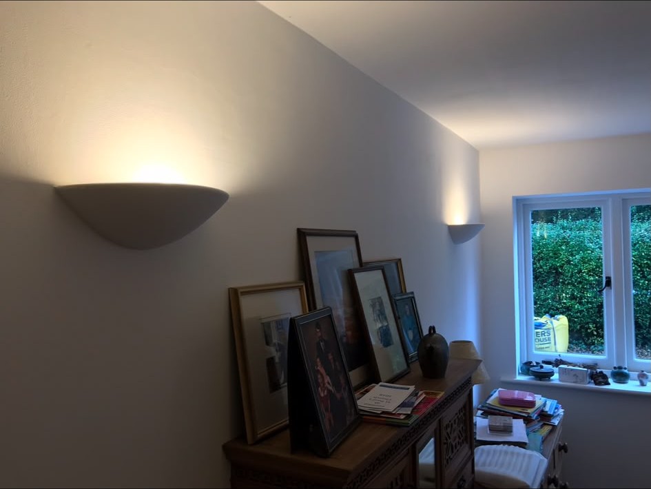Wall light installation completed and switched in a finished room