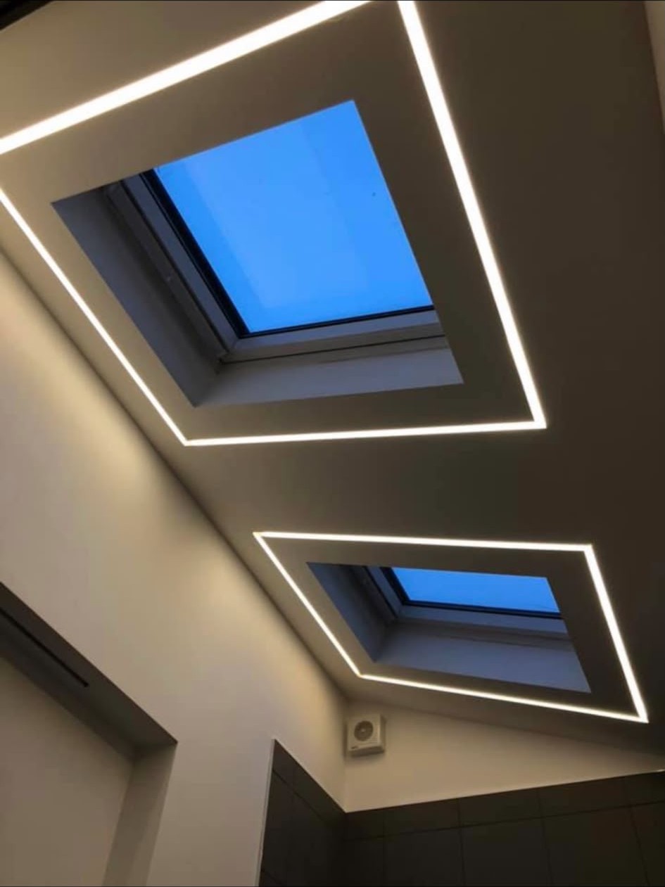 LED strip and cove lighting installed to ceilings, handrails and skylight reveals