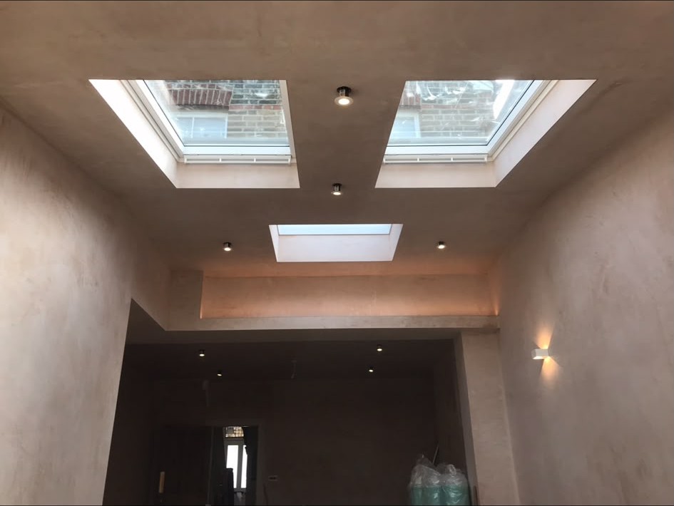 Recessed LED downlights installed and wired into a finished ceiling