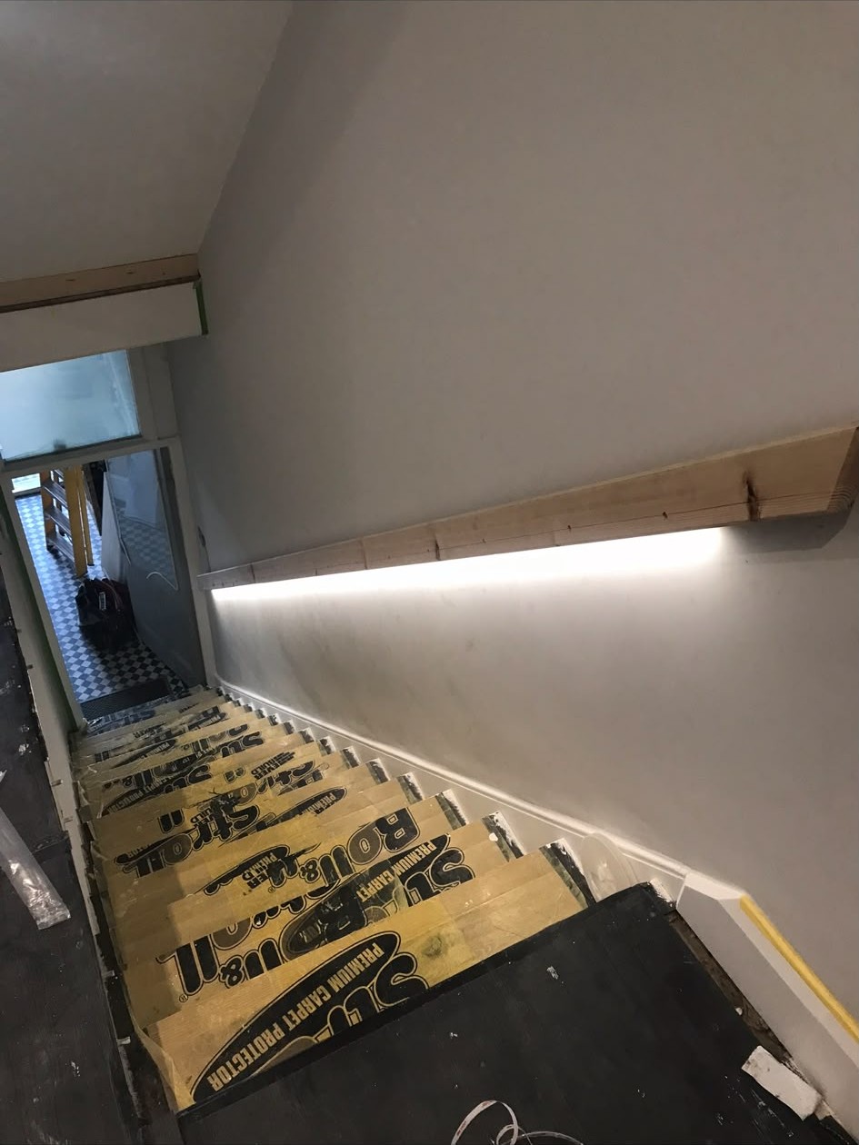 LED strip and cove lighting installed to ceilings, handrails and skylight reveals