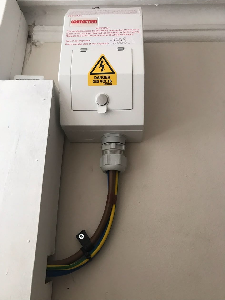 Contactor enclosure installed and wired in a loft space